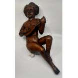 A 19th cent Italian carved seated nude Lute player