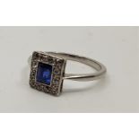 An Art Deco platinum, sapphire and diamond ring, set baguette cut blue sapphire (approx. weight 0,50