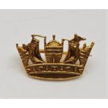 Military/RAF interest: A 9ct. gold Royal Navy coronet brooch, length 19mm. (1.6g)