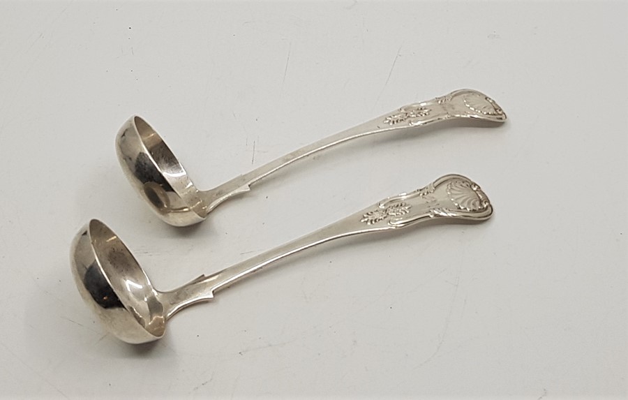 A pair of Scottish Victorian Kings pattern silver sauce ladles, by Marshall & Sons, Edinburgh