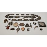 A small collection of silver and white metal jewellery, to include: a Victorian silver oval brooch