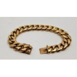 A gentleman's 18ct. gold heavy curb link bracelet, length 19cm. (97.4g) Condition note: Link width