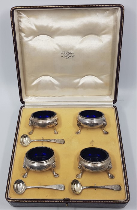 A set of four George III silver circular salts, by "I*M", assayed London 1762, with blue glass - Image 4 of 4