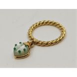 Attributed to De Grisogono, a 9ct. gold "ladybird" ring, having rope twist band suspending