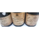 Five bottles of vintage Champagne including Bollinger, Moet and Krug