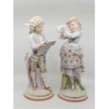 A pair of late 19th century hand painted porcelain figurines, printed and impressed factory marks,