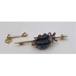 A Victorian precious yellow metal, black garnet and rose cut diamond set "beetle" pendant/brooch,