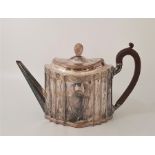 A 19th century silver plated tea pot, in the neo-classical style, with fruit wood handle and