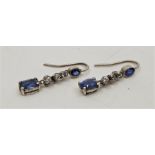 A pair of 19th century white metal, sapphire and diamond drop earrings, each with wire hook