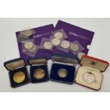 A small collection of commemorative coins and medallions, including a Gibraltar 1969 New