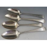 A small collection of four "Old English" silver table spoons including London 1812 by Peter &