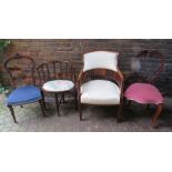 An Edwardian marquetry inlaid low tub armchair with stuff over 55cm upholstery. Raised on square