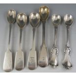 A pair of Victorian cast silver "cartouch pattern" mustard spoons probably London 1840s but marks