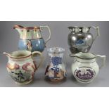 A group of early nineteenth century jugs and a vase, c. 1820. Comprising of: a blue and white