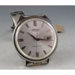 A vintage Seiko 5 sportsmatic with stainless case and two tone bracelet. The day date dial with