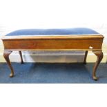 A 1920's stained wood cabriole legged duet piano stool. 105cm  Provenance: From The Sadia Walsh