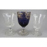 A Victorian amethyst and clear rummer with petal panelbody bearing a gilt inscription (indistinct)
