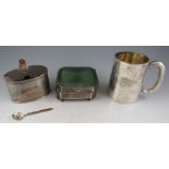 An early 20th century silver Christening mug of plain tapering form monogramed J.M.S, 7cm high.