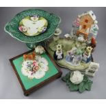 A mixed group of nineteenth and twentieth century ceramics to include; a green-glazed footed