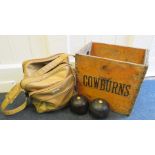 A set of four vintage lignum vitae bowls with inset Ivorine roundles together with a