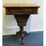 A Victorian satin wood strung walnut rectangular work table with concave trumpet base. 59cm wide and