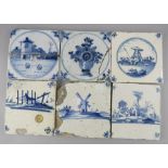 A group of six eighteenth century blue and white hand-painted Delft tin glazed earthenware tiles, c.