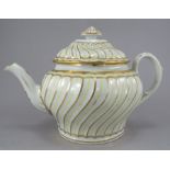 A late eighteenth century Chamberlain Worcester teapot, c. 17890-1800. The moulded form is decorated