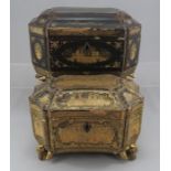 An early 19th century black papier Mache two section tea caddy of cartouche form. Painted with