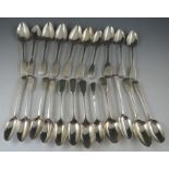 A collection of mostly 19th century silver teaspoons to include: a set of six "fiddle pattern"