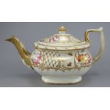 An early nineteenth century porcelain Coalport teapot and cover, c. 1810-20. It is decorated with