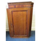 A George III mahogany crossbanded single door hanging corner cupboard. 74cm wide Provenance: From