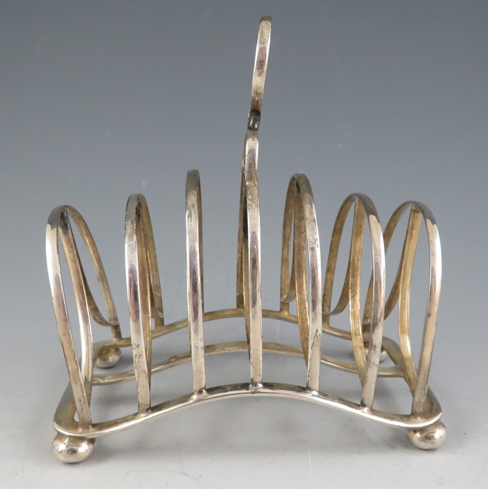 A late Victorian silver six section toast rack of unusual arched form with simple loop handle and - Image 2 of 3
