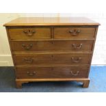A George III mahogany chest of two short over three long drawers, raised on bracket supports 94cm