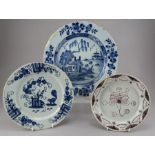 Three eighteenth century Dutch Delft tin glazed earthenware plates, c. 1760. One is painted with a