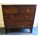 A 19th century mahogany chest of two short and one long drawers with shaped apron support.88cm