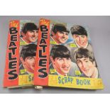 Two Beatles Scrap books (two volumes) featuring mounted A & B C bubblegum cards, magazine