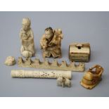 A Chinese possibly Ming dynasty carved ivory scholars pen rest on mountain range form together