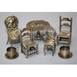 A collection of ealy 20th century mostly Dutch  silver "toys" to include:tripod table, pair of