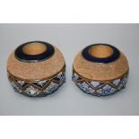 Two similar late 19th century Royal Doulton stoneware globular bar top strikers with bands of blue