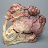 A carved Chinese hardstone model of a sea dragon 9 x 10 cms.