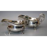 Goldsmiths and Silversmiths company limited, a pair of Geo.VI silver sauce boats, each with acanthus