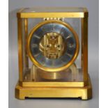 A Jaeger Le Coultre "Atmos"(no 59976) mantle clock with visible mechanism, silvered chapter ring and