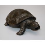 A 20th century carved and polished stone tortoise. 13cms.