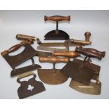 A collection of mostly 19th century wooden handled  cast steel herb choppers / mezzalunas