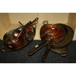 A  collection of  vintage and antique  tinned  cooking pans to include  two handled oval saute pans,