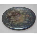An opalescent studio art glass dish, indistinctly signed to base. 18 cms diameter.