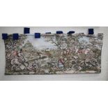 A decorative Medieval style machine tapestry wall hanging with tab top hanging. 147 x 71cm
