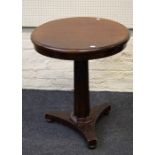 A 19th century mahogany veneer and stained lamp table, the circular tilt top on hexagonal column,