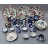 A collection of Chinese Qing dynasty porcelain including a famille rose bottle vase with aftermarket