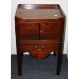 A Geo III mahogany, tray topped night commode with double doors and sliding lower section. 52cm wide